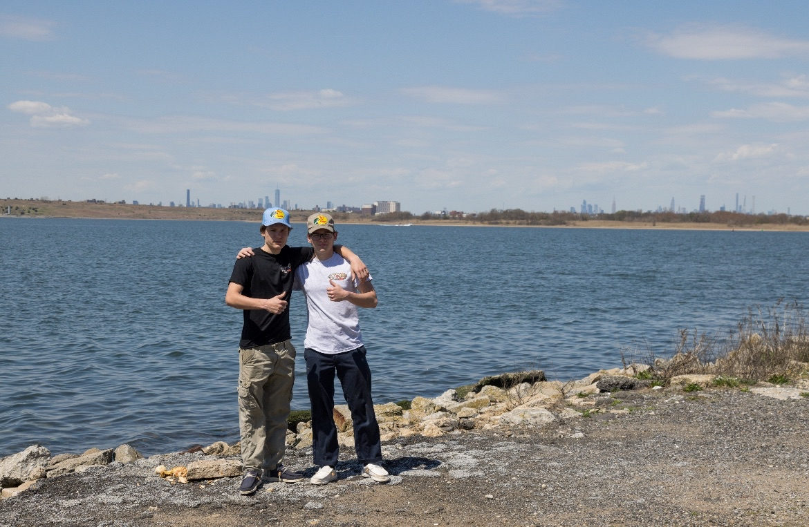 AOG Performance founders at the waterfront with NYC skyline